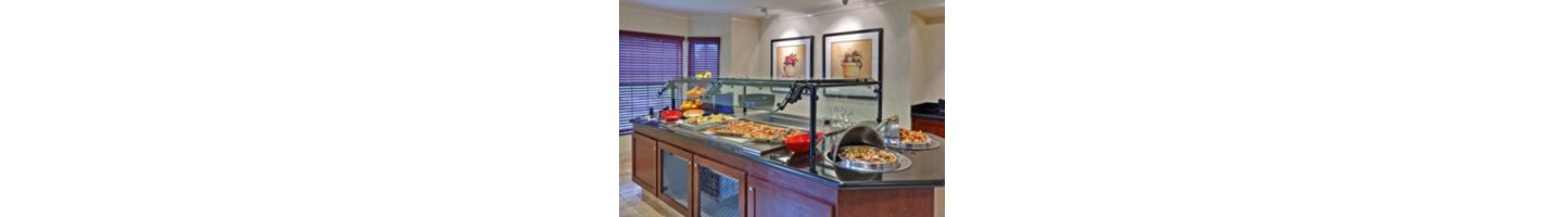 Join us for the Evening Social, offered Monday-Wednesday from 5:30 - 7:00 pm. With complimentary beer, wine, light dinner, and conversations, it’s a breath of fresh air after a long day of work or traveling.